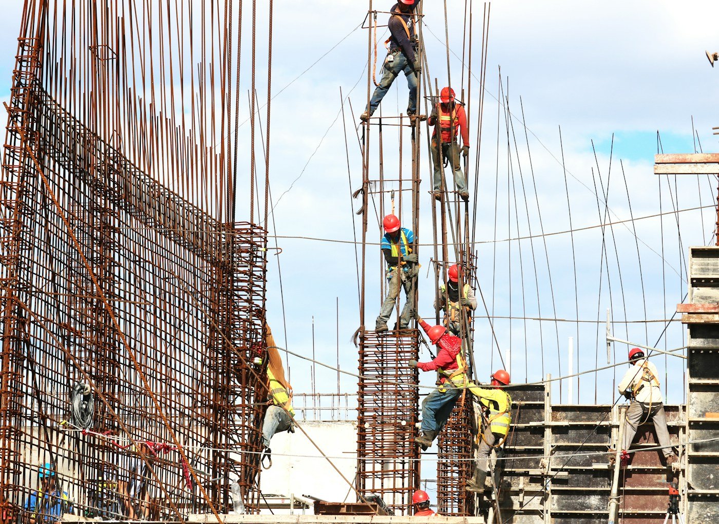 Contractors reviewing drawings and construction scope